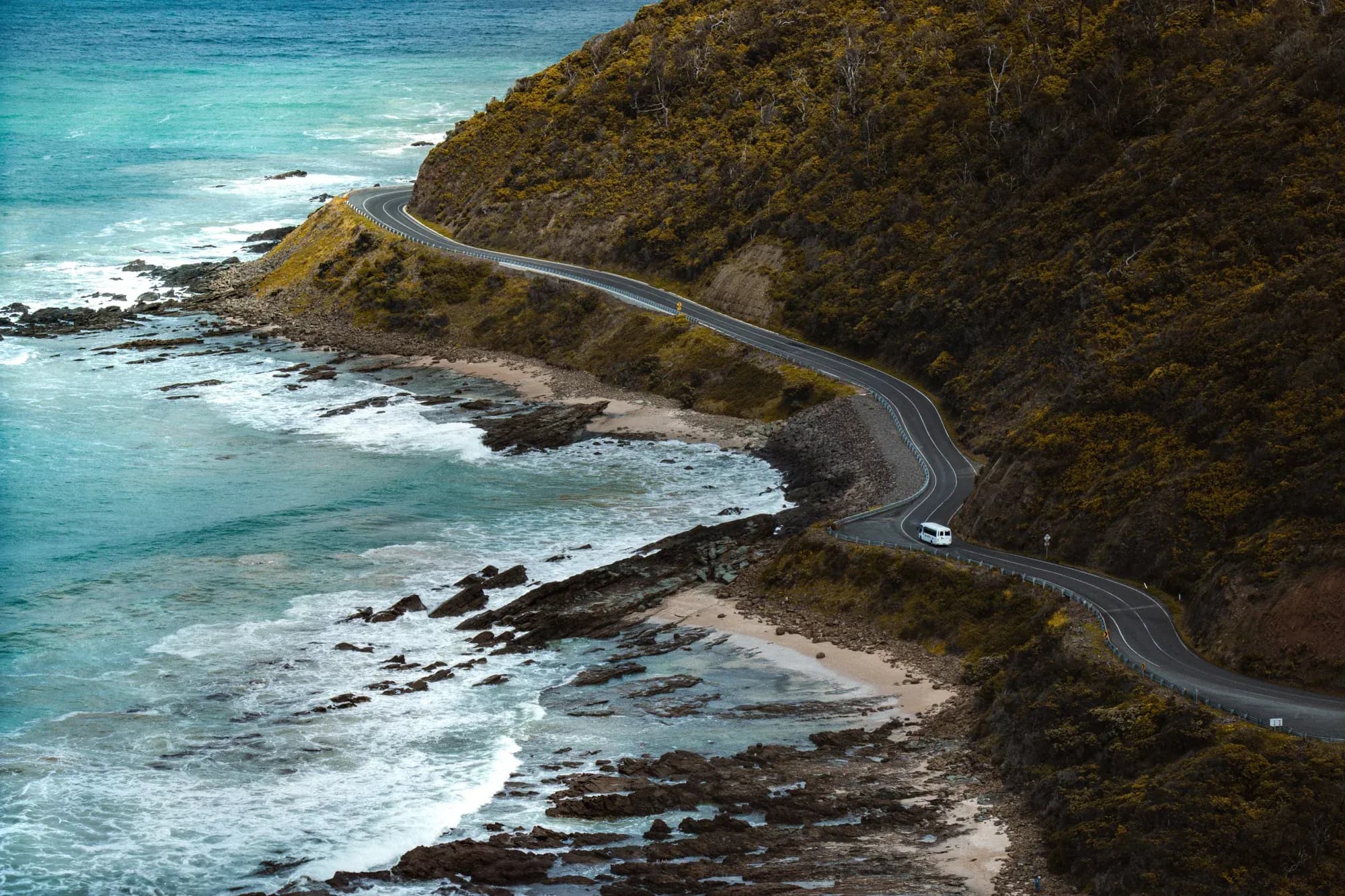 A winding coastal road above the Southern Ocean